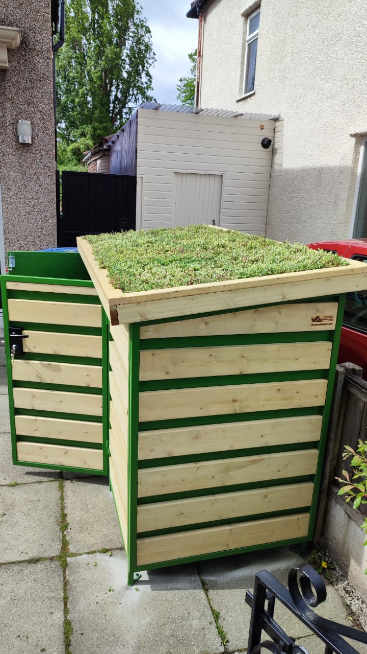 Wooden  box with sedum roof top on a patio
